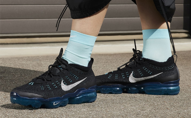 A Woman Wearing Nike Air VaporMax 2023 Flyknit Shoes