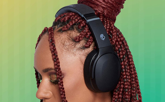 A Woman Wearing Skullcandy Crusher Evo Bluetooth Wireless Headphones