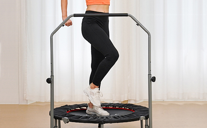 A Person Exercising Using a Rebounder