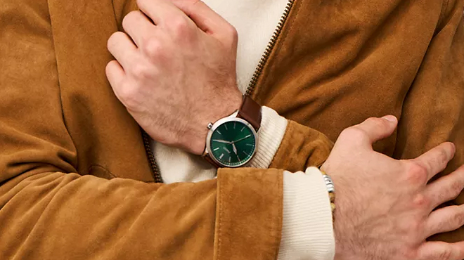 A person wearing a Fossil Fenmore Three Hand Leather Watch