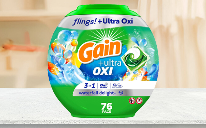 Gain 76 Count Flings Detergent on a Table