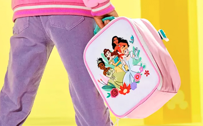 Girl Holding a Disney Princess Lunch Box