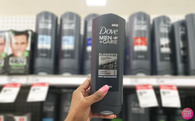 Hand Holding DOVE MEN CARE Elements Body Wash