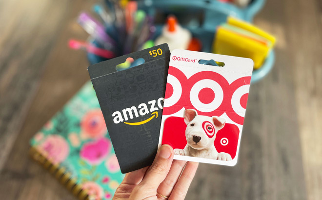 Hand holding 2 Gift Cards for back to school giveaway