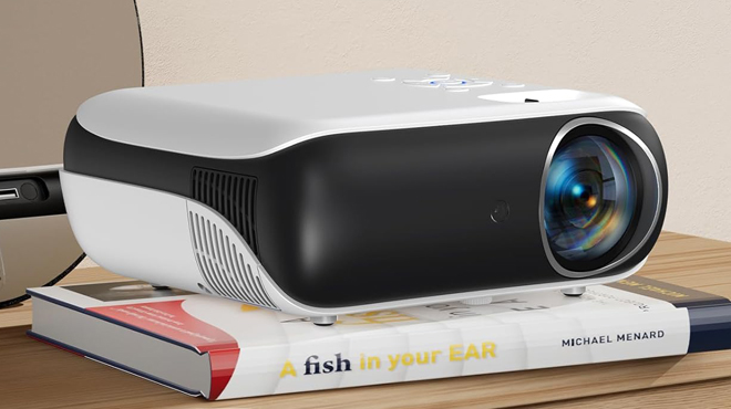 Happrun Mini Bluetooth Video Projector on a Table