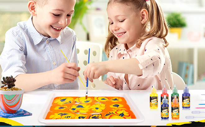 Kids Playing with Water Marbling Paint