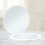 LED Compact Makeup Mirror on a Table