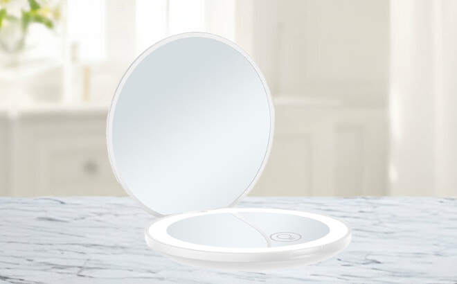 LED Compact Makeup Mirror on a Table