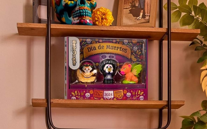 Little People Collector Dia de Muertos Special Edition Figure Set on a Shelf