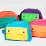 Lug Colorblock Cosmetic Cases on the Table