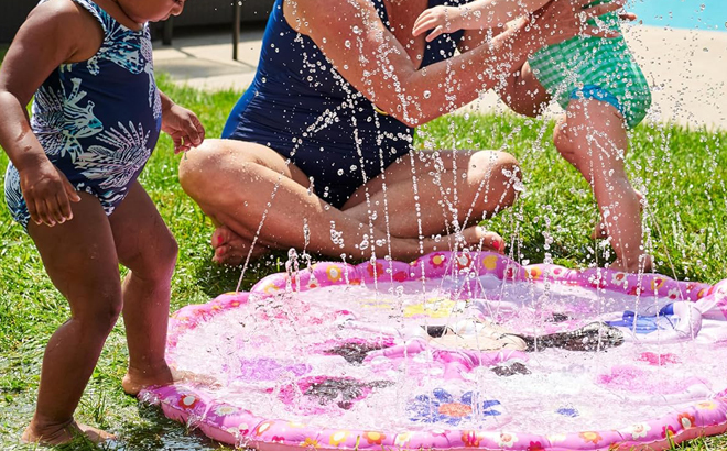 People playing around Kids Splash Mat