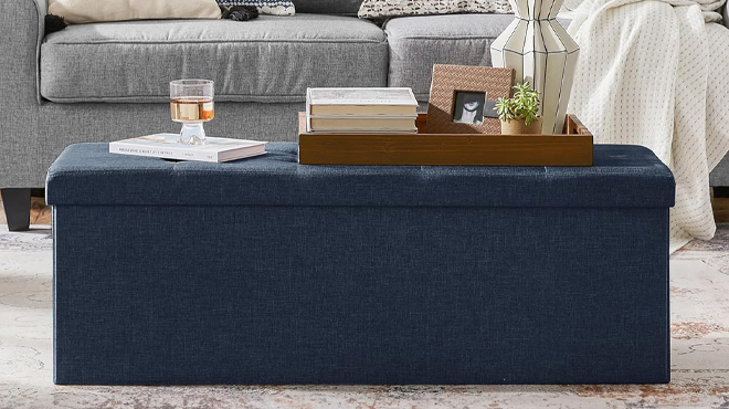 SONGMICS Dark Blue Storage Ottoman Bench in a Room