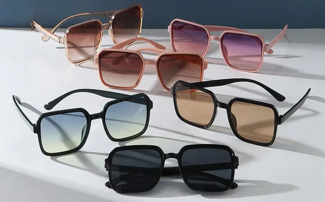 Six Pairs of Fashionable Sunglasses on a Table