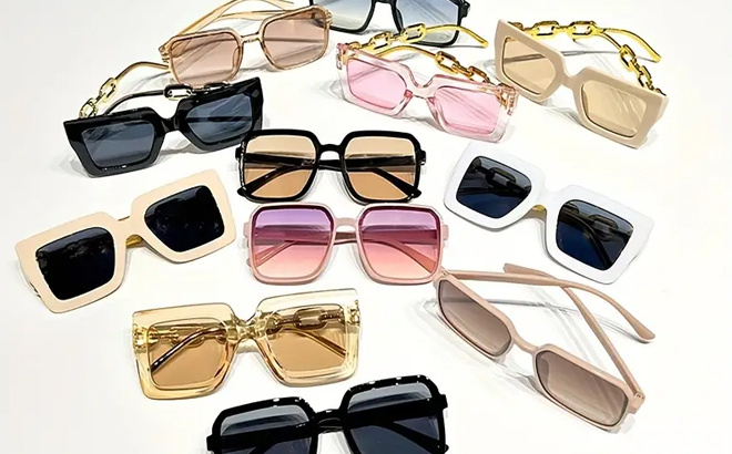 Six Pairs of Women's Fashionable Sunglasses on a Table