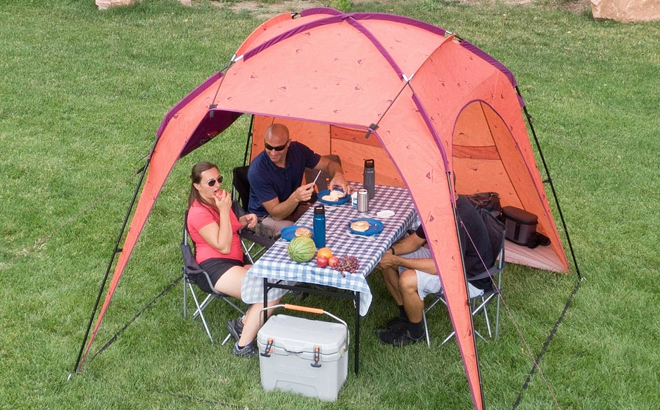 Three People Inside Ozark Trail Orange Sun Shelter Beach Tent