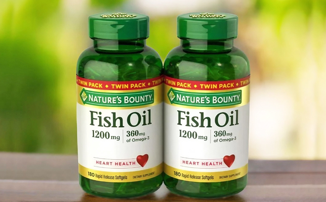 Two Bottles of Natures Bounty Fish Oil on a Table