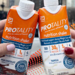 Two Persons Holding Protality Nutrition Shakes