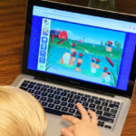 a Kid Using ABCmouse Learning Program