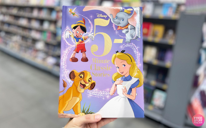 a Person Holding 5 Minute Disney Classic Stories Hardcover Book