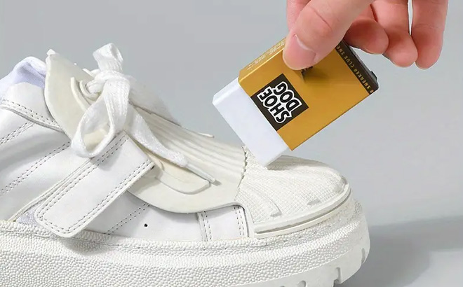 a Person Using Shoe Cleaning Eraser