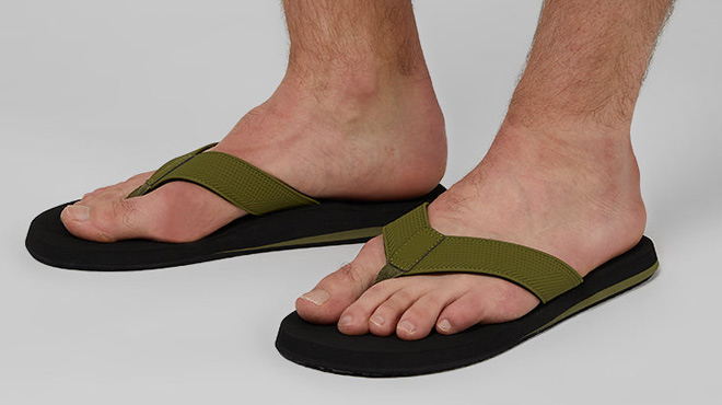 a Person Wearing 32 Degrees Mens Casual Flip Flops