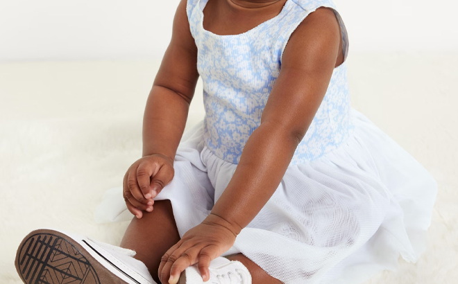 A Baby Girl Wearing Old Navy Sleeveless Rib Knit Bodysuit Tutu Dress