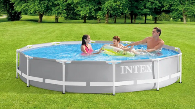 A Family Swimming on a Intex 10 x 30 Light Gray Steel Frame Set Pool