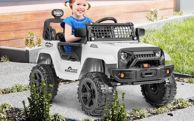 A Girl Riding an Electric Ride on Truck