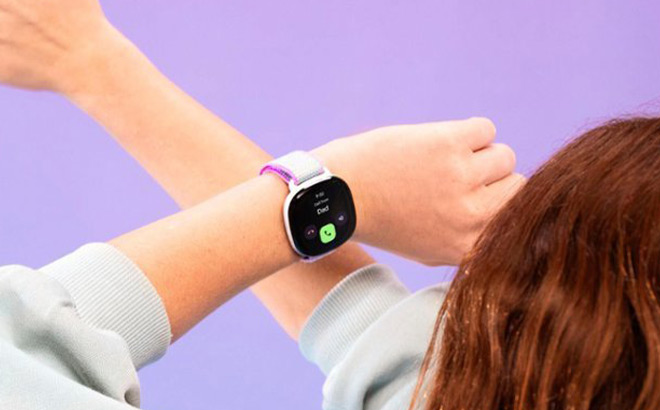 A Girl Wearing Fitbit Ace LTE Kids Smartwatch