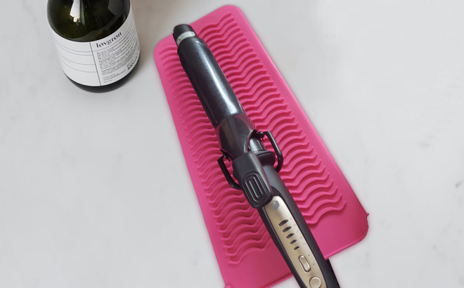 A Hair Curling Tool Cooling on the Heat Resistant Silicone Mat Pouch