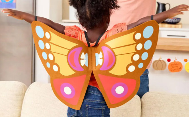 A Little Girl with Wearable Butterfly Wings