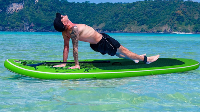 A Man Exercising on the Feath R Lite Inflatable Paddle Board