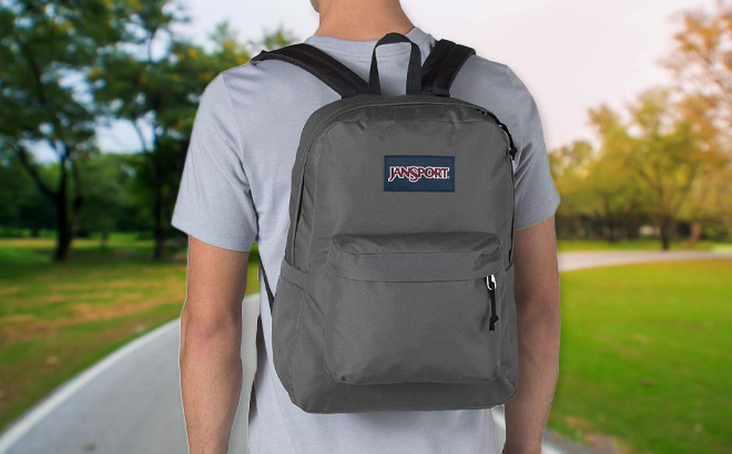 A Man Wearing JanSport SuperBreak One Backpack