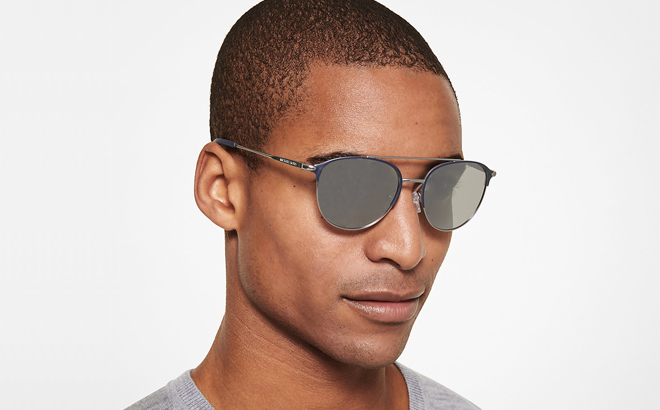 A Man Wearing Michael Kors Dune Sunglasses