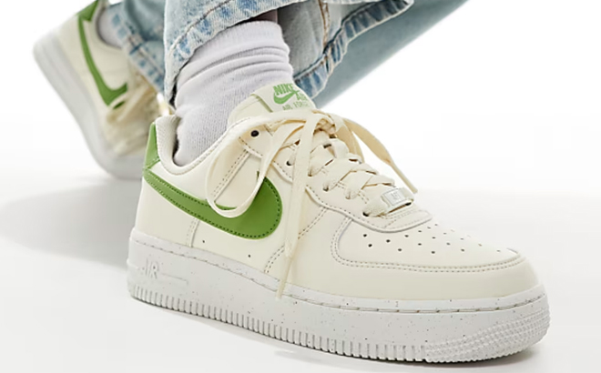 A Man Wearing Nike Air Force 1 Sneakers