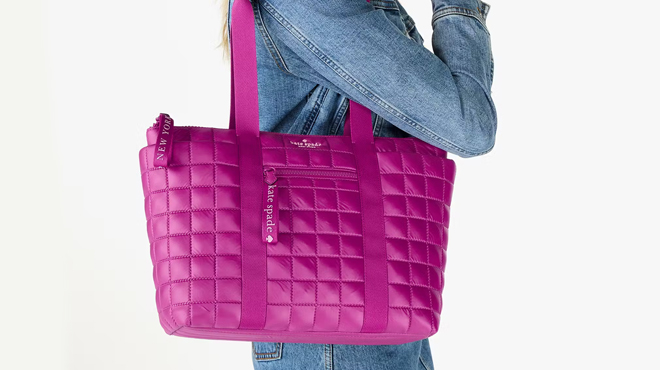 A Person Carrying a Kate Spade Camden Quilted Small Tote