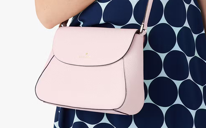 A Person Carrying a Kate Spade Monica Flap Crossbody