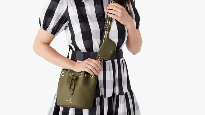 A Person Carrying a Kate Spade Rosie Mini Bucket Bag