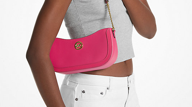 A Person Carrying a Michael Kors Leida Small Pochette