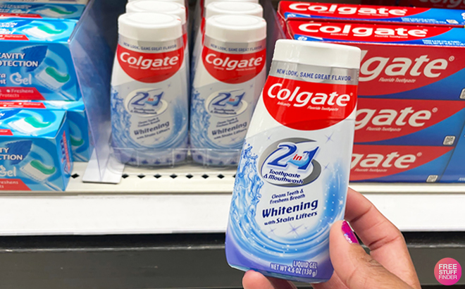 A Person Holding Colgate 2 in 1 Whitening Stain Lifters Toothpaste