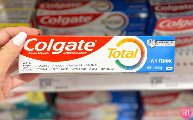 A Person Holding Colgate Total Whitening Toothpaste