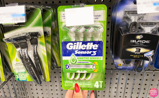 A Person Holding Gillette Sensor3 Disposable Razor 4 ct