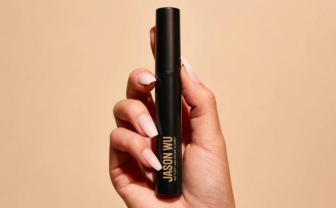 A Person Holding Jason Wu Beauty Hot Fluff Lash Mascara