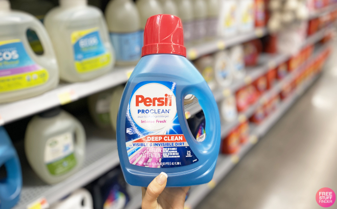 A Person Holding Persil Intense Fresh Everyday Clean Liquid Laundry Detergent