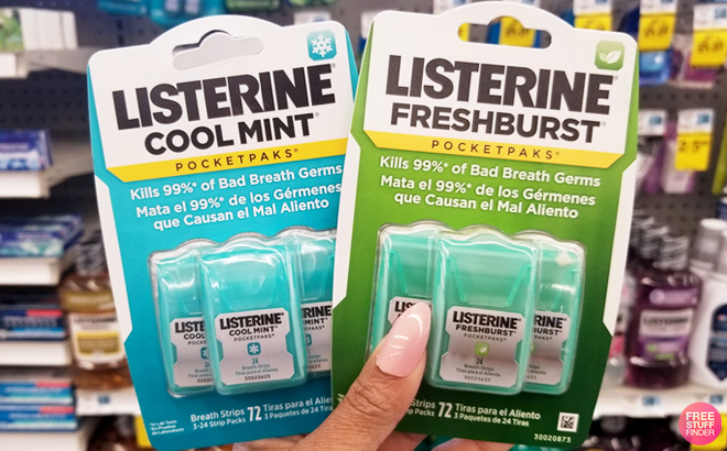 A Person Holding Two Packs of Listerine Cool Mint Pocketpaks 3 Count