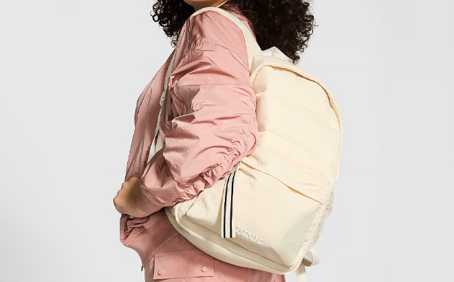 A Person Holding Victorias Secret Pink Quilted Puffer Backpack