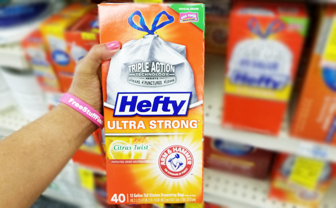 A Person Holding a 40 Count Box of Hefty Ultra Strong Tall Kitchen Trash Bags