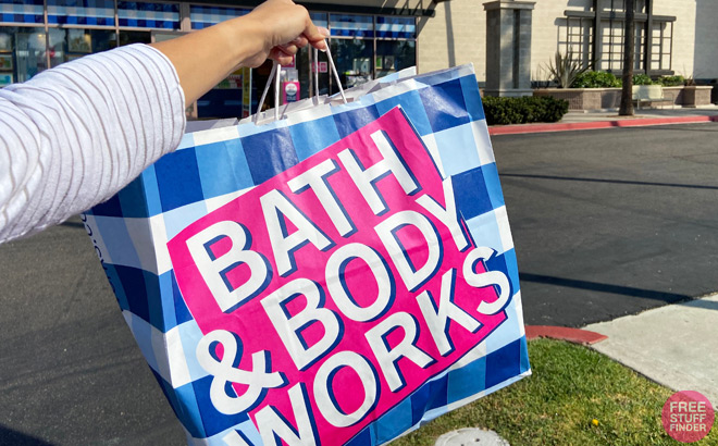 A Person Holding a Bath and Body Works Shopping Bag