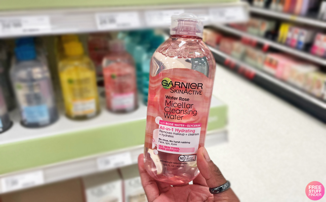 A Person Holding a Bottle of Garnier Micellar Water with Rose Water