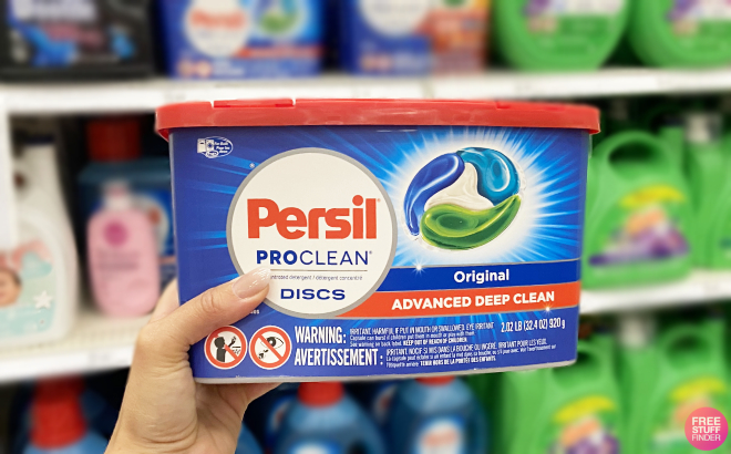 A Person Holding a Tub of Persil Ultra Pacs Original Everyday Clean Laundry Detergent